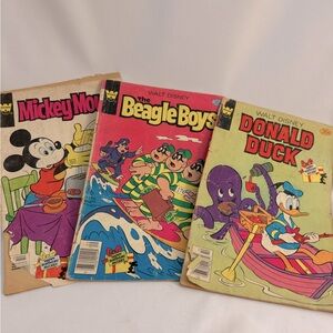 Vintage Comic Books. Cover shows wear and age. Page discoloration as well.